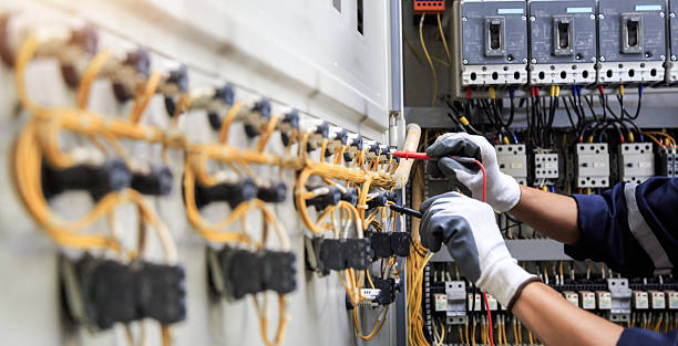 Professional Electrician technician working in Homewood, AL